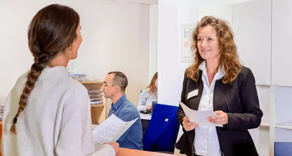 Woman explaining something to a donor